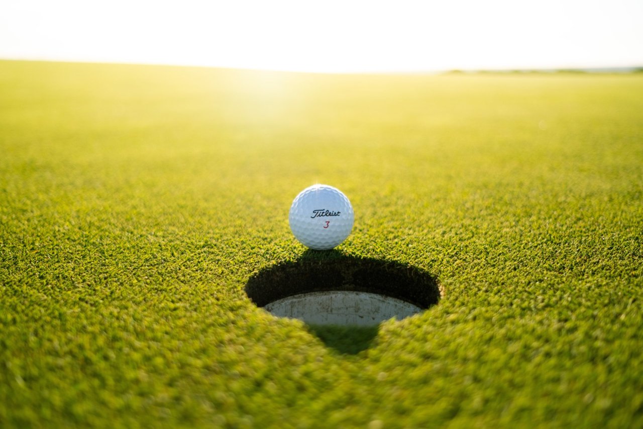 golf ball by hole