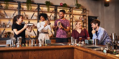 Cocktail Masterclass at Roe & Co - pic by Diageo ICP visitors try mixing cocktails at irish distillery