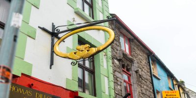 Streetscape, Galway City Courtesy Failte Ireland gold claddagh symbol sign